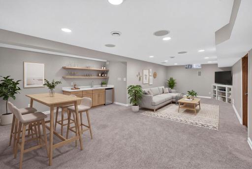 Virtually staged to showcase the lower levelâs potential; wet bar feasibility has not been verified.