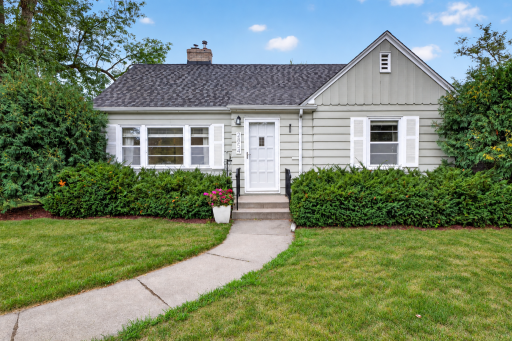 Charming exterior welcomes you to this classic, beautifully maintained home. Virtually enhanced grass
