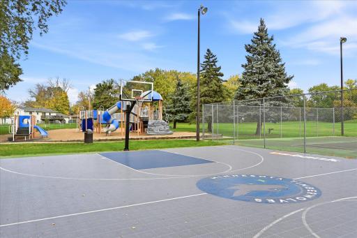Another view of basketball court and playground.