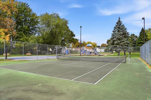 Tennis Court, basketball court and playground.