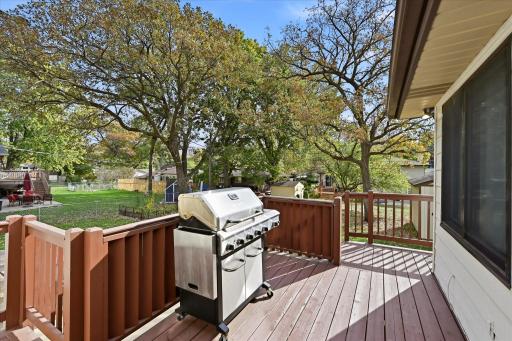 Step outside to a welcoming deck designed for summer barbecues, morning coffee, and gathering with family and friends.