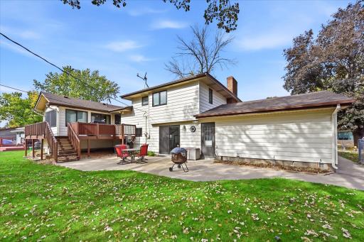 A 30-year Timberline architectural shingle roof adds peace of mind, while the large patio and deck off the porch provide exceptional space for outdoor dining, gatherings, and backyard enjoyment.