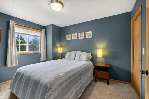 Secondary upper level bedroom with walk in closet