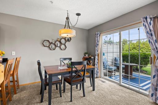 Plenty of space to sit for a meal, with the breakfast bar at the kitchen, the dining room area, or the lovely outdoor patio seating.