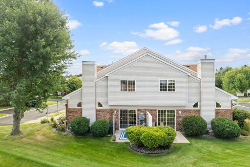 Professionally maintained yard and back area of this end unit townhome