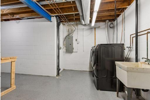 Lower level laundry and mechanical area. New furnace and AC in 2025!