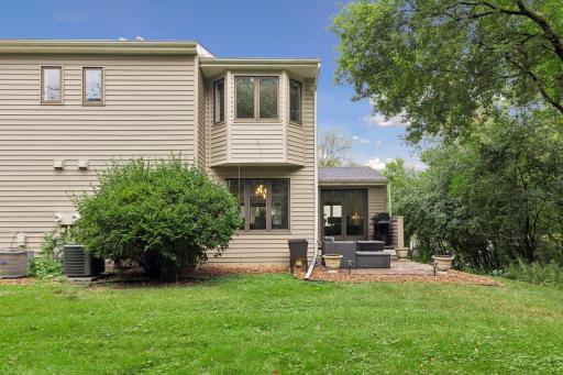 Rear view of the home and patio area.