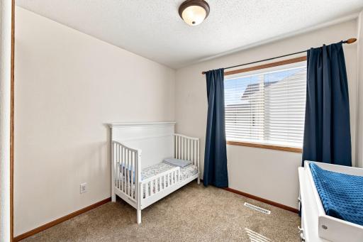 2nd upstairs Bedroom has a custom closet organizer.