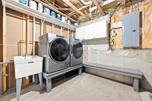 Laundry Room - has plenty of space for a soaking sink and storage. (Washer, Dryer, and laundry bench/pedestal excluded.)