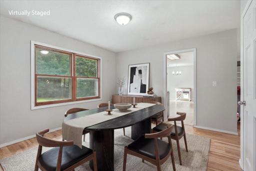 12-Dining VIRTUALLY STAGED.jpg