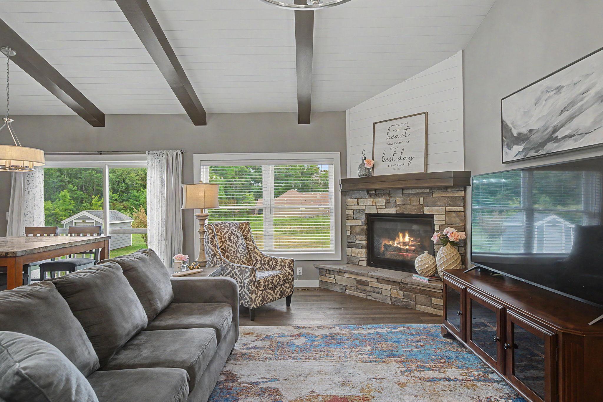 Stone gas fireplace for ambiance & warmth!