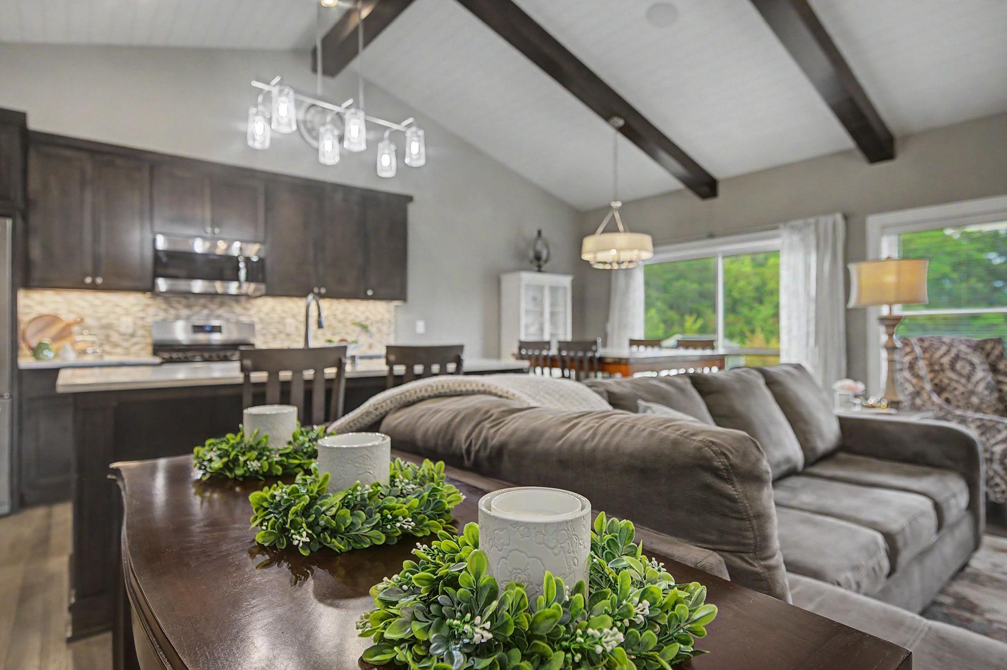 Custom alder beams anchor the space!