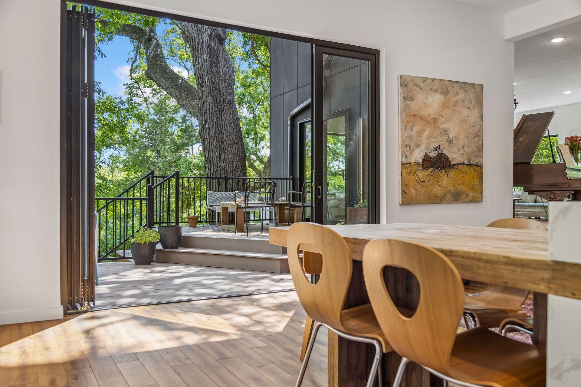 Kitchen opens up to large outdoor deck area