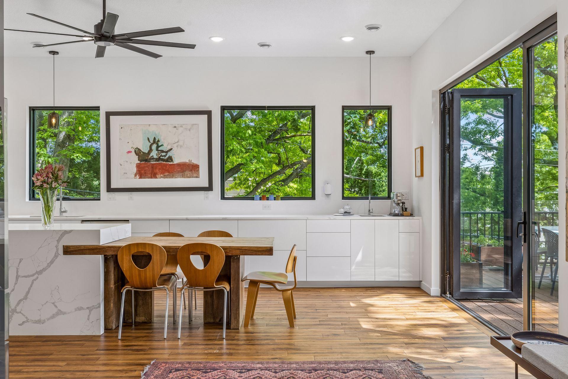 The large windows throughout, bring the outdoors in