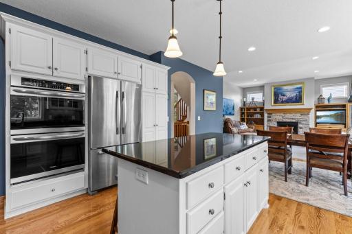Stainless undermount sink provides a clean, streamlined workspace. Bosch induction cooktop offers exceptional performance for everyday cooking and entertaining. Double convection ovens feature convenient air fry and bread proofing modes.