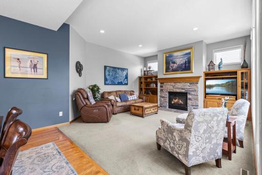 Built-in oak cabinetry provides beautiful display and storage space alongside the fireplace.