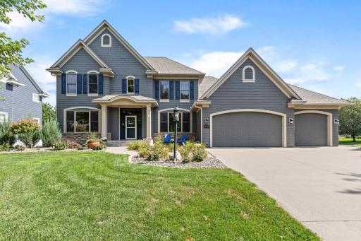 Updated landscaping enhances the home's polished and well-maintained exterior. Front solar-shield windows are among the home's thoughtful recent improvements.