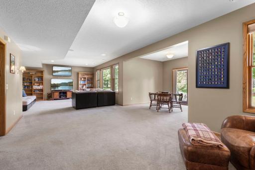 Additional family room space is ideal for a game or recreation area. Flexible lower-level bonus area works beautifully for exercise equipment, hobbies, or play space.