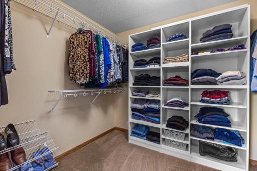 Generous walk-in closet completes the private primary suite.