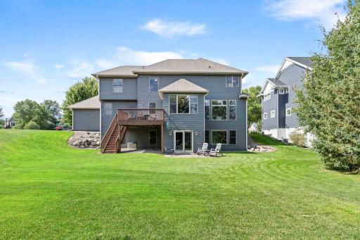 Garage improvements include an updated opener and springs on the double garage door. Recent improvements include a new washer, Bosch cooktop, double ovens, and water softener.