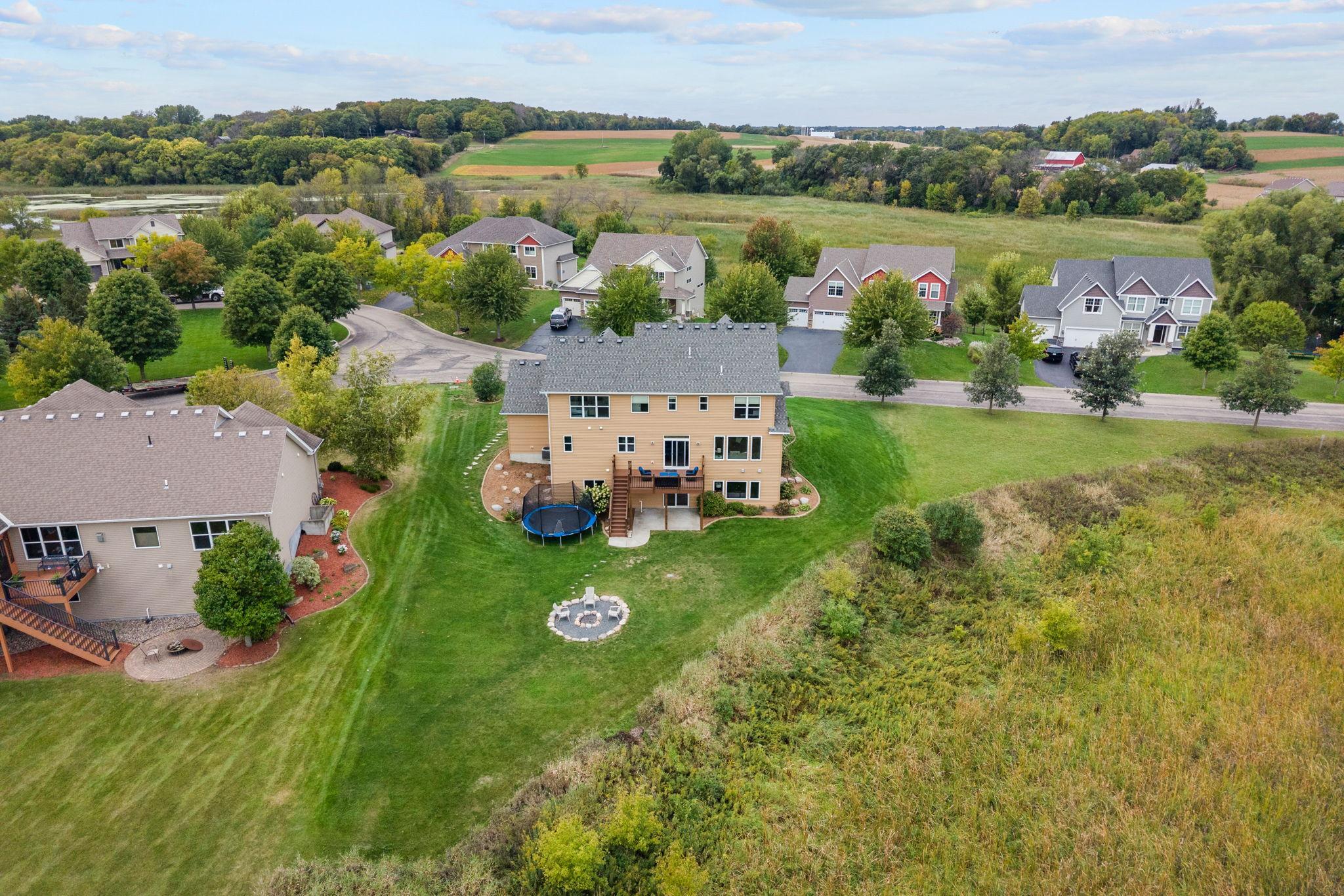 STUNNING custom-built home on nearly 1 ACRE, located on a quiet cul-de-sac