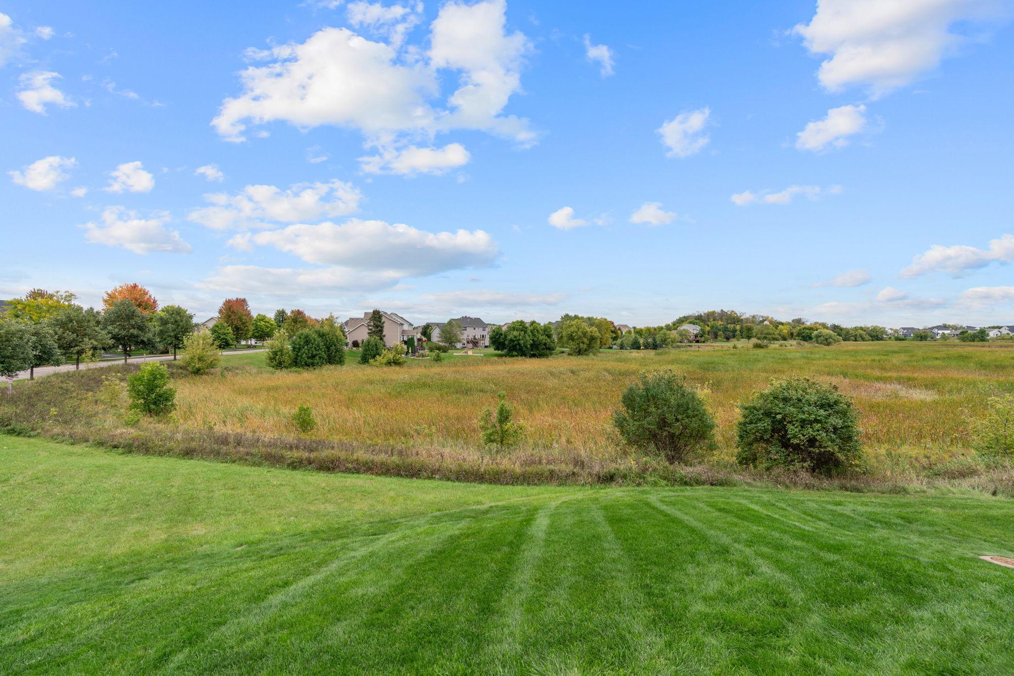 STUNNING custom-built home on nearly 1 ACRE, located on a quiet cul-de-sac