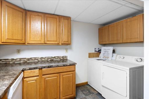 Lower-level kitchen includes its own washer and dryer, adding even more independence and convenience to this separate living space.