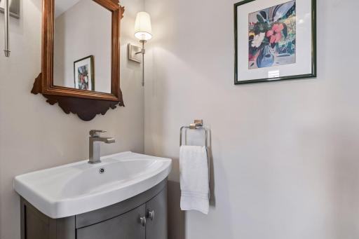 The 1/2 bath is conveniently located off the foyer.
