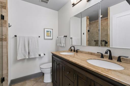 Oversized vanity with dual sinks and storage