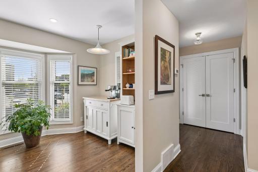 This view shows the kitchen plus the foyer's coat closet. Off the foyer is the 1/2 bath - on the right.