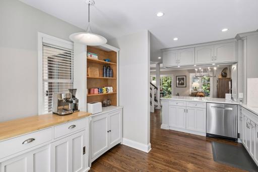 The kitchen is loaded with prep space and storage.