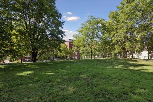 The green space of this development is unique. It's a park like setting that is set up to be enjoyed by people in the development.