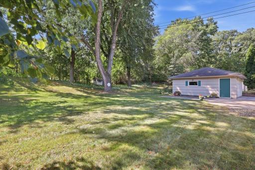 Backyard - shed behind garage for extra storage