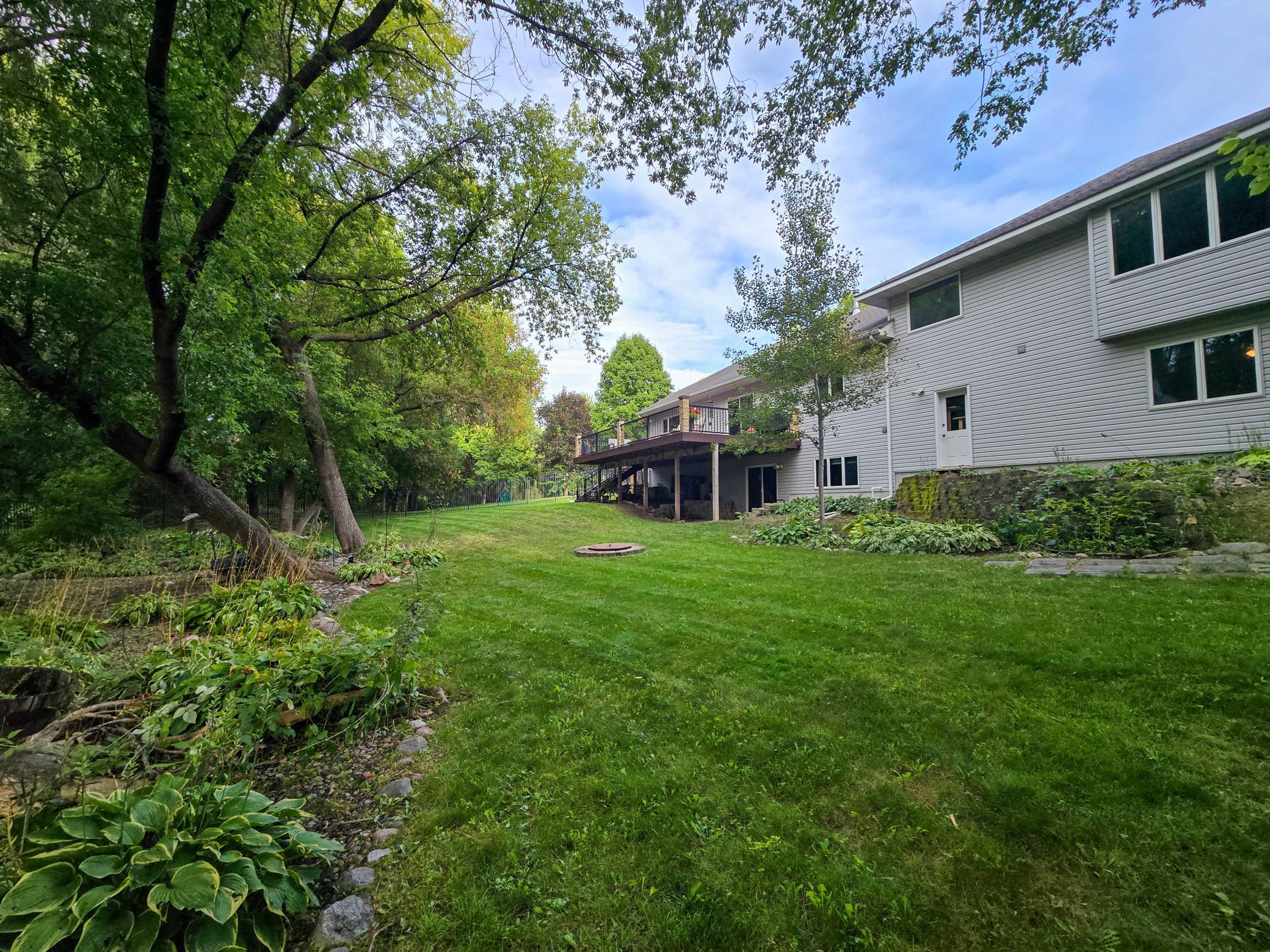 Large beautifully landscaped fully-fenced private back yard!