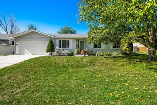 This rambler style home has three bedrooms on the main level, and an incredible BIG and FENCED BACKYARD with a maintenance free Deck. NEW FURNACE in 2025, the roof was new in 2019. White Kitchen and finished lower level too!