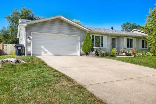 Front angled view of this rambler home. Note the driveway is concrete, the roof was installed in 2019, the backyard is big and flat and fenced. The furnace was new in the home in 2025.