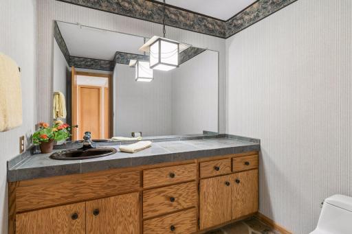 Main floor half bath near front entry.