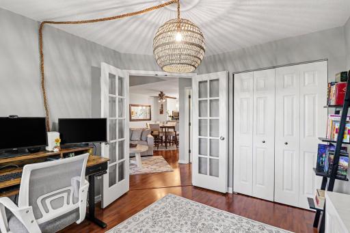 Bedroom #2 features french doors.