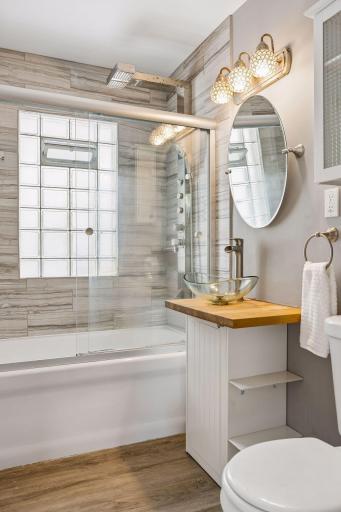 Main Level Bathroom- Tiled Tub and Shower