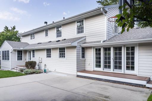 Sport court or patio. Backyard accessed by french doors in dining room or mud room door