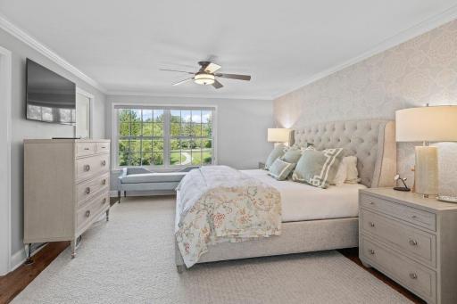 Stunning primary suite with dual walk-in closets