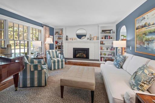 Living room with fireplace and built-ins....