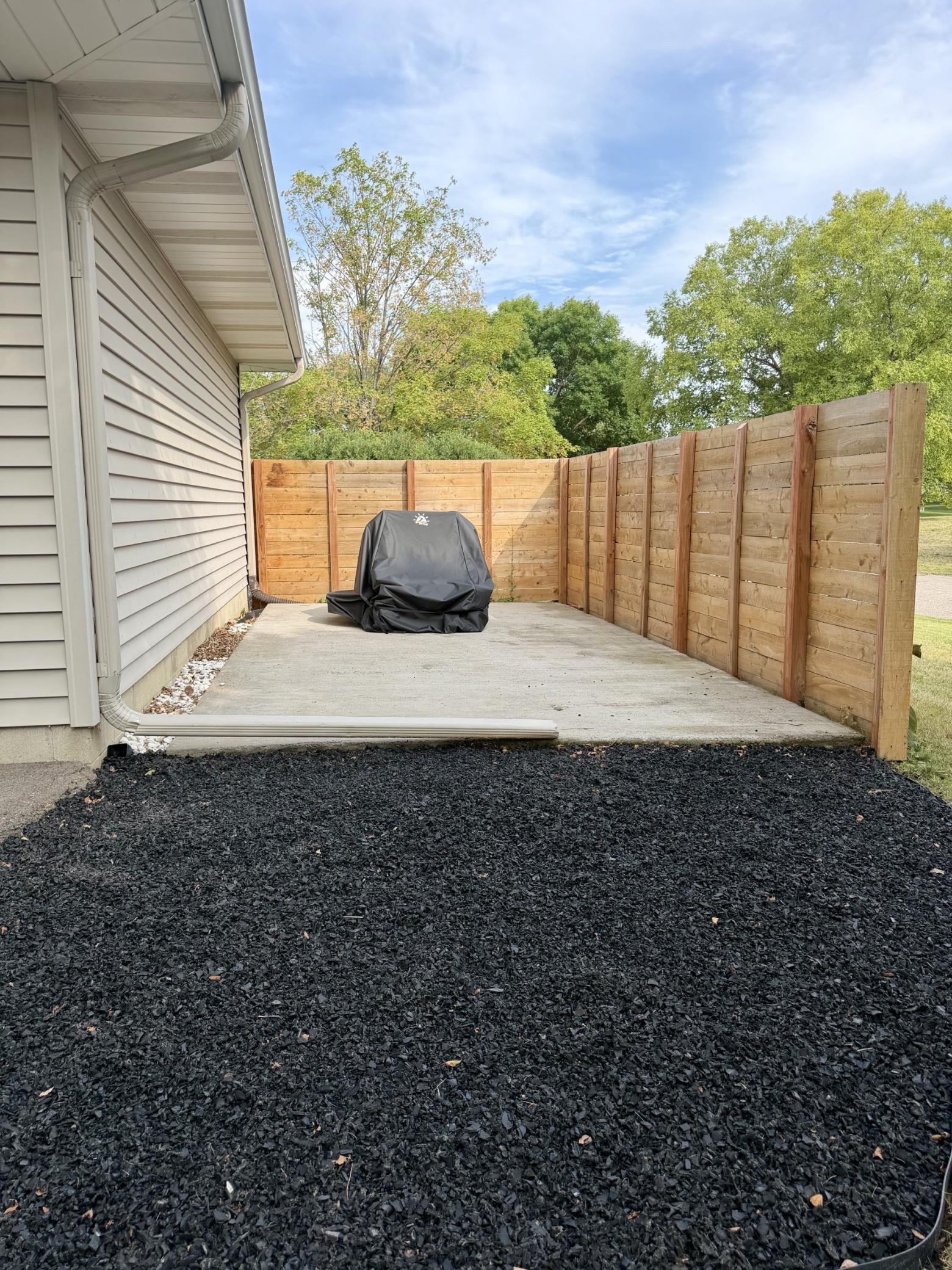 Sellers built this side fenced in pad to hold some of their out door necessities