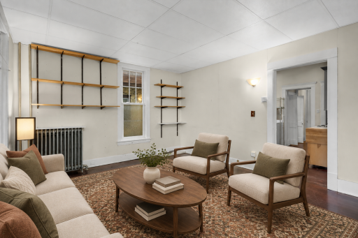 Photo has been virtually staged for illustrative purposes. Unit 1 - Living Room2.png