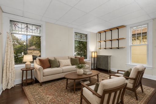 Photo has been virtually staged for illustrative purposes. Unit 1 - Living Room1.png