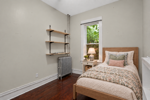 Photo has been virtually staged for illustrative purposes. Unit 1 - Bedroom.png