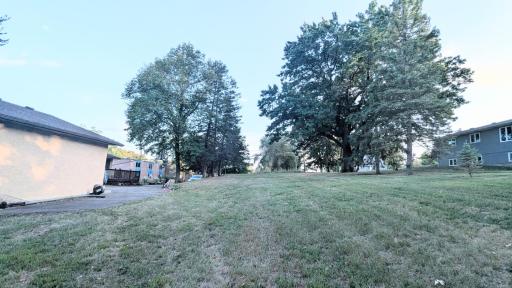 Property on the west side of home goes up to almost the second tree line.