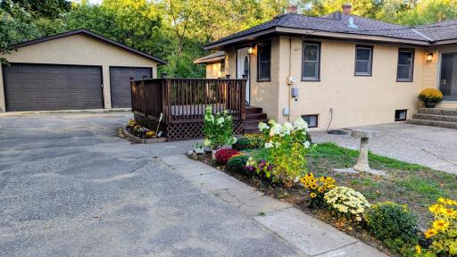 It's bigger than it looks. Freshly remodeled home on approx 3/4 acre with oversized 3-car garage.and flexible lower living spce wit kitchen and partially finished bath.