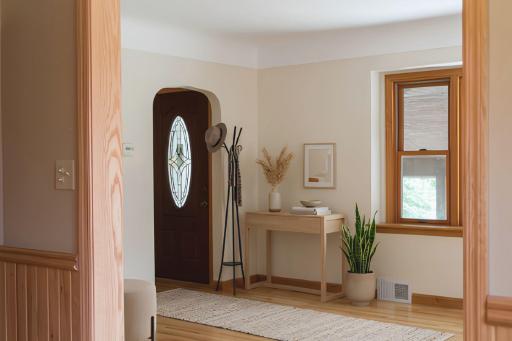 Foyer leads to the covered patio. Virtually staged