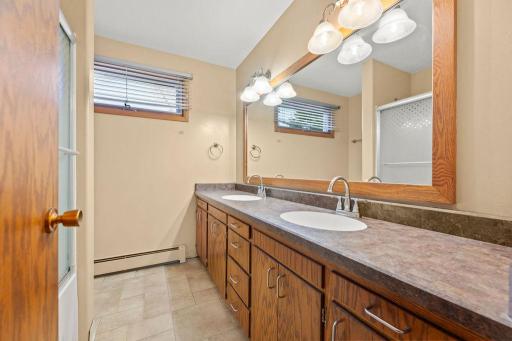 Double vanity, tons of storage, & window outside